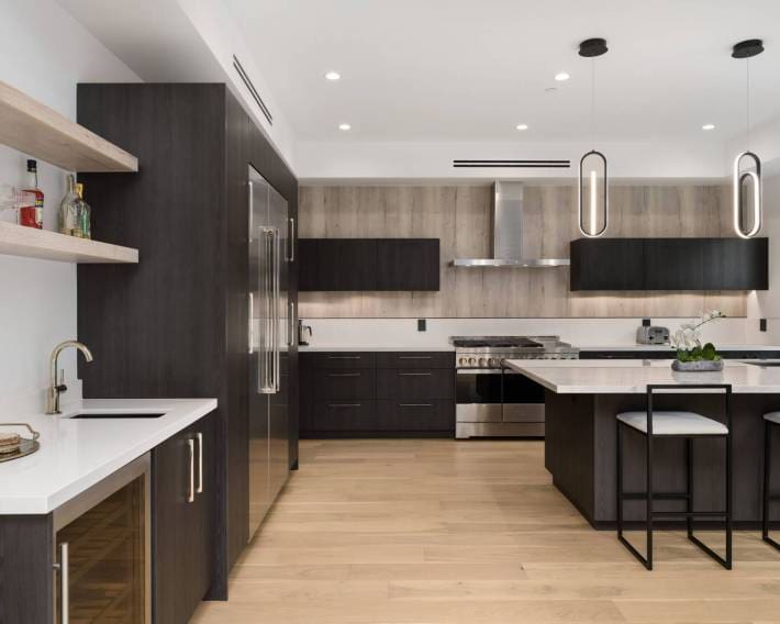 Modern kitchen with two bar stools at the counter